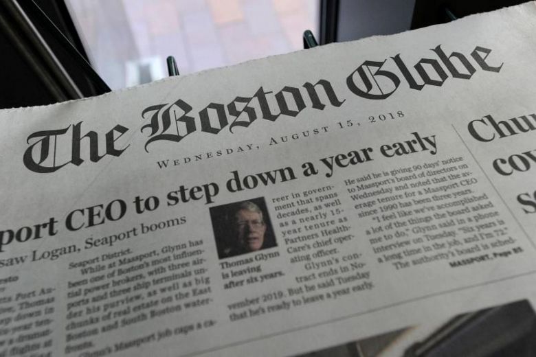 The Boston Globe’s front page in paper form